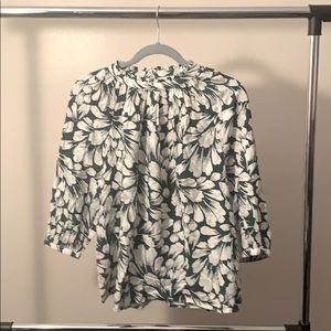 Women’s causal/dress top designed by Hinge.